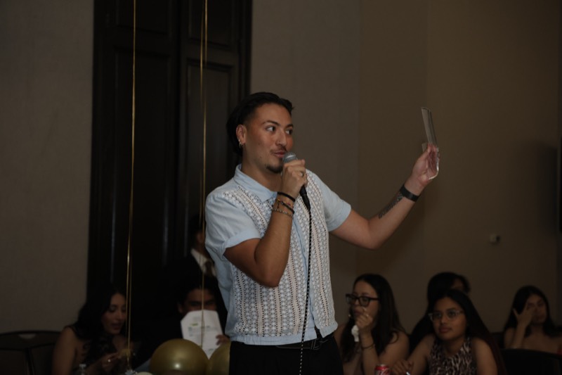 Daniel receiving the CLACY award
