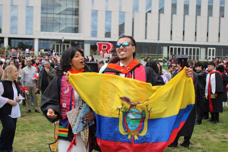 Daniel holding the Ecuadorian flag